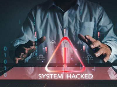 Businessman using computer laptop, System warning hacked alertsign for notification error personal data hacking  virus  cybercrime.concept Cybersecurity vulnerability computer network.